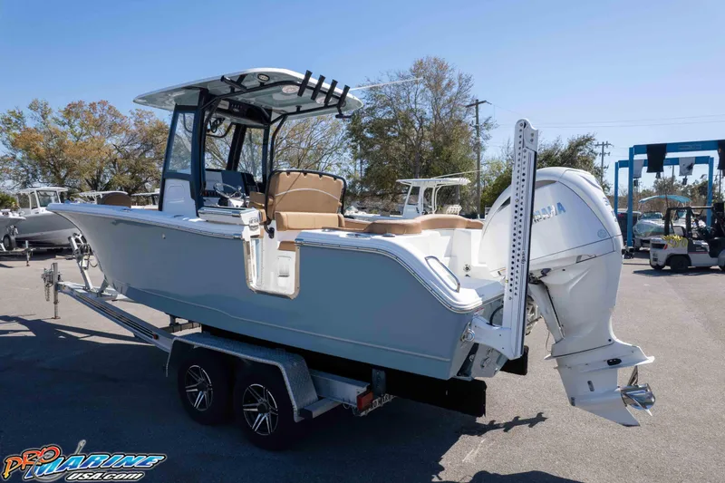 Slide: The Image of 2023 Sea Hunt Ultra 255 SE boat on trailer, outdoor display. - 42