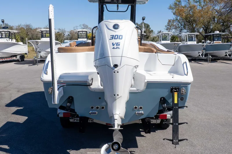 Slide: The Image of 2023 Sea Hunt Ultra 255 SE boat with powerful 300 V6 engine, rear view. - 44