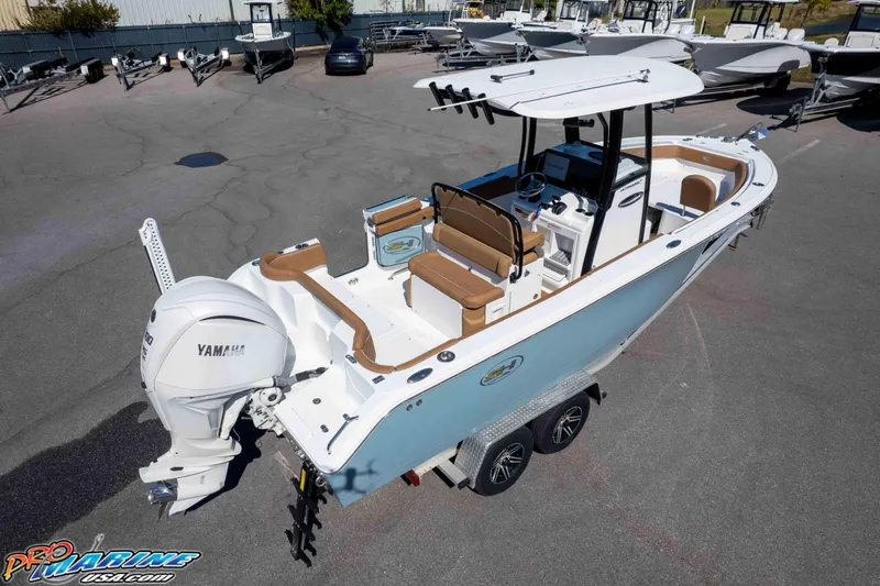 Slide: The Image of 2023 Sea Hunt Ultra 255 SE boat with Yamaha engine, parked on a trailer. - 48