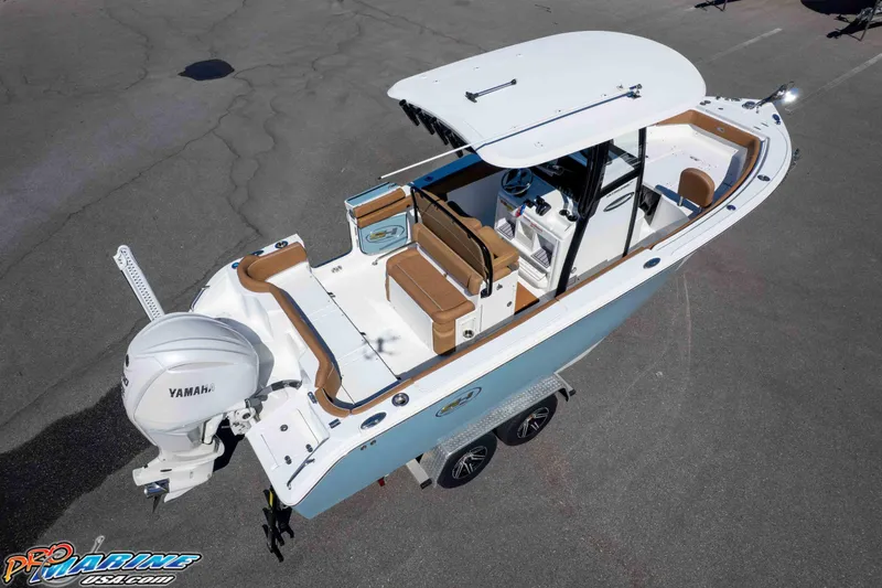 Slide: The Image of 2023 Sea Hunt Ultra 255 SE boat with Yamaha engine, aerial view. - 49