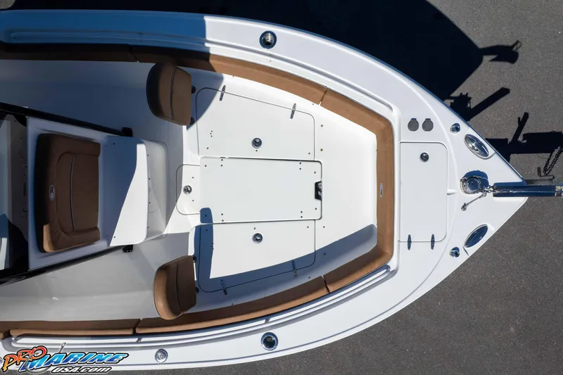 Slide: The Image of Top view of 2023 Sea Hunt Ultra 255 SE boat with brown seating and white deck. - 52
