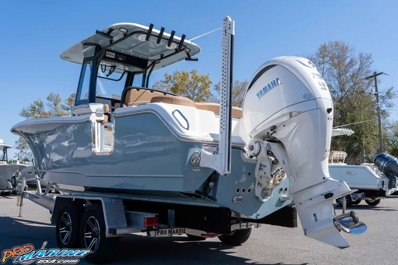 Slide: The Image of 2023 Sea Hunt Ultra 255 SE boat with Yamaha engine on trailer. - 6