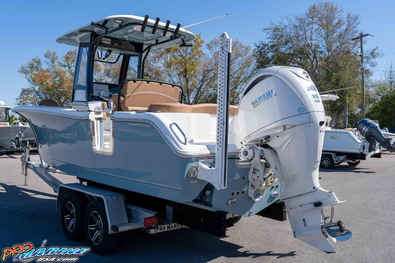 Slide: The Image of 2023 Sea Hunt Ultra 255 SE boat on trailer with Yamaha outboard motor. - 7