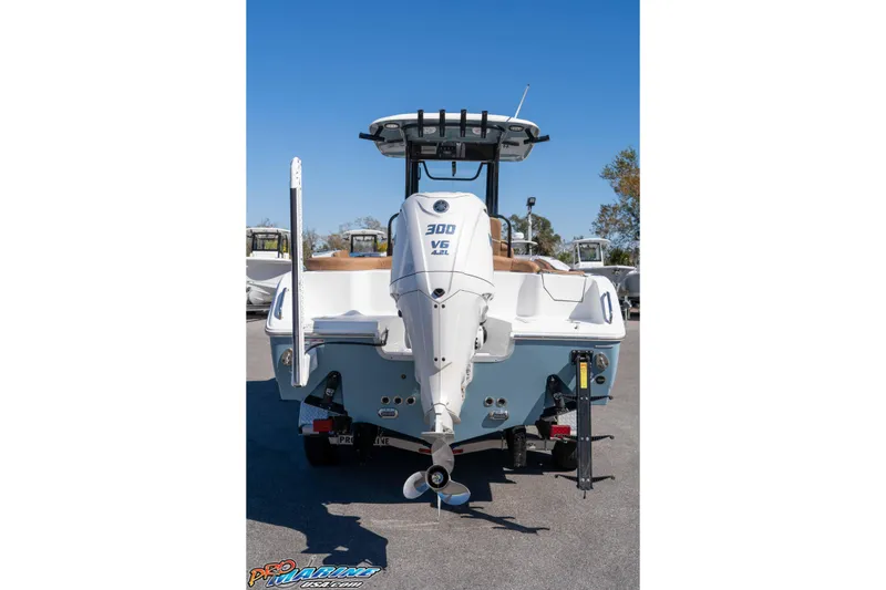 Slide: The Image of 2023 Sea Hunt Ultra 255 SE boat with powerful 300 V6 engine, rear view. - 8