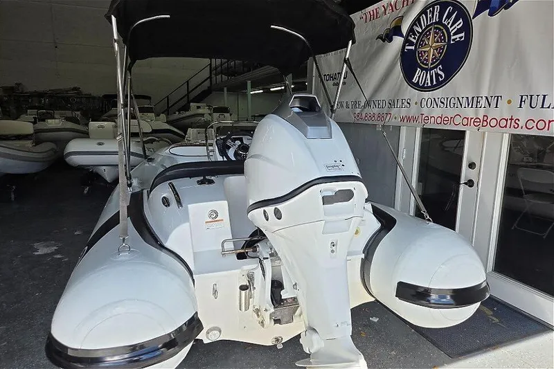 Slide: The Image of 2021 Walker Bay Generation 360 with Tohatsu 50HP outboard motor in showroom. - 8