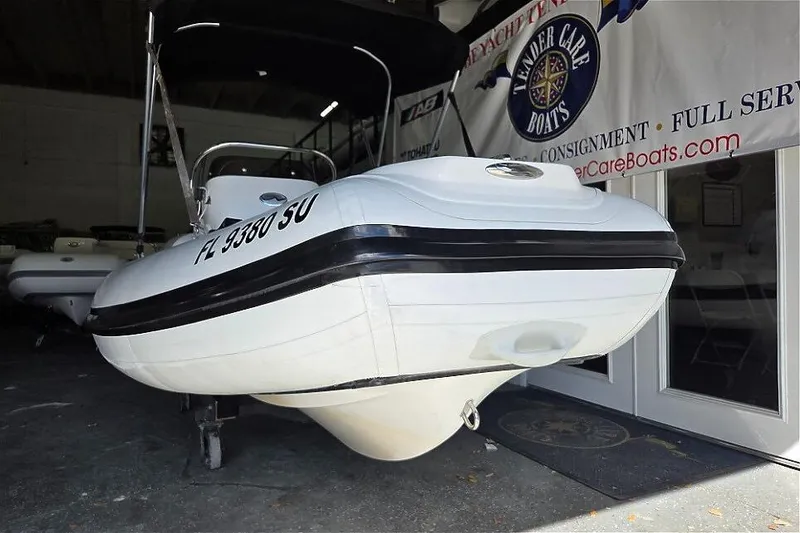 Slide: The Image of 2021 Walker Bay Generation 360 boat with Tohatsu 50HP engine in showroom. - 9