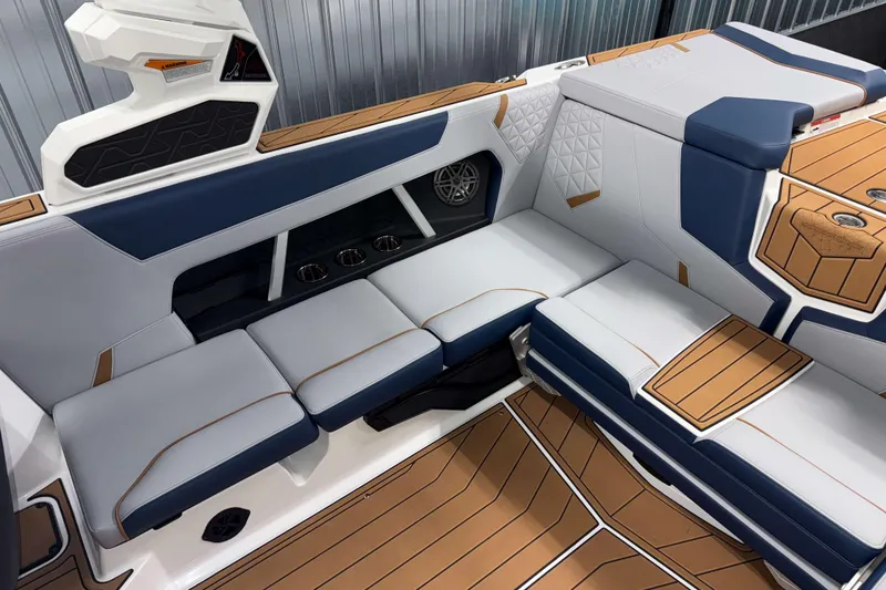 Slide: The Image of 2026 Nautique Super Air Nautique GS22 interior with luxurious seating and modern design. - 12