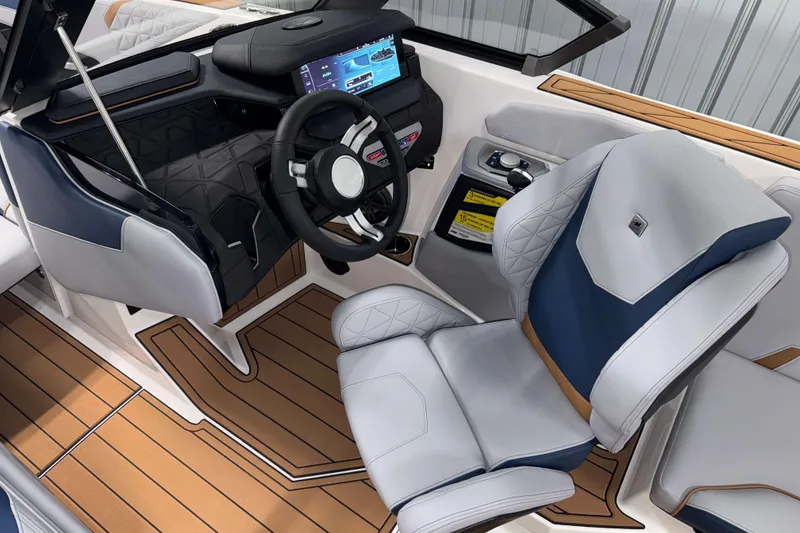 Slide: The Image of 2026 Nautique Super Air Nautique GS22 interior with modern dashboard and luxurious seating. - 17