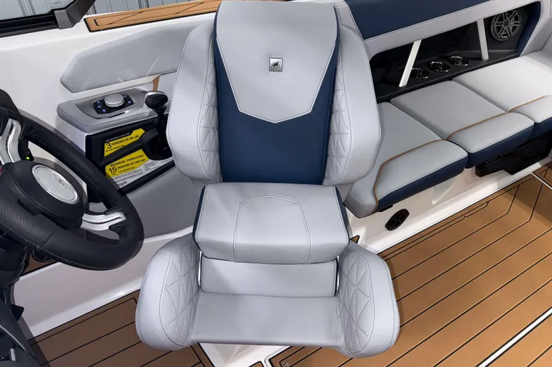 Slide: The Image of 2026 Nautique Super Air Nautique GS22 interior with luxury seating and modern controls. - 18