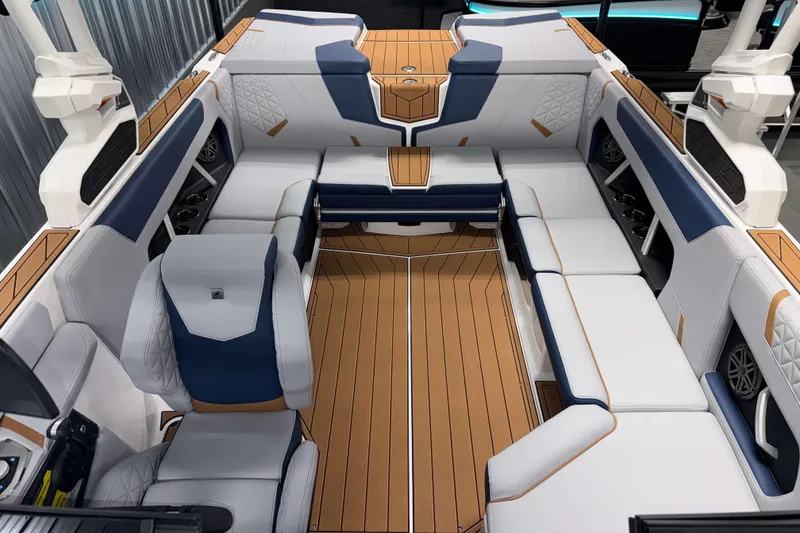 Slide: The Image of 2026 Nautique Super Air Nautique GS22 interior with luxurious seating and modern design. - 27