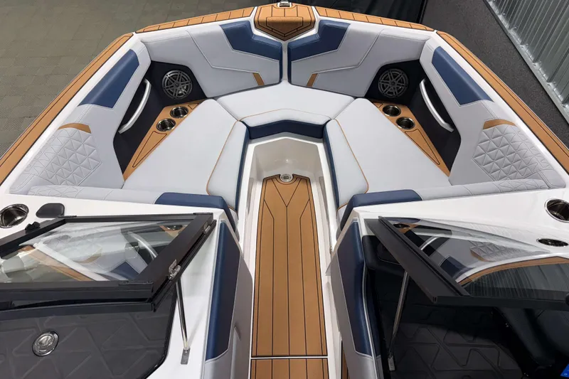 Slide: The Image of 2026 Nautique Super Air Nautique GS22 boat interior with luxurious seating and modern design. - 29
