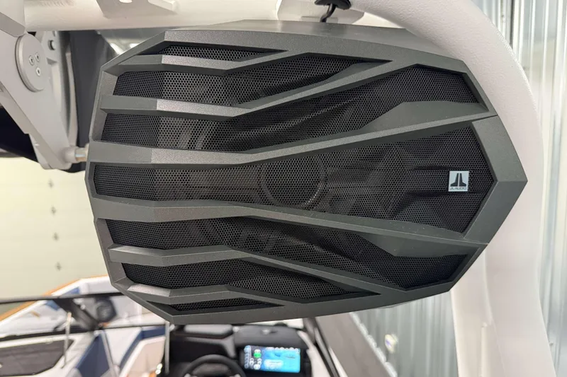 Slide: The Image of Close-up of a JL Audio speaker on a 2026 Nautique Super Air Nautique GS22 boat. - 41