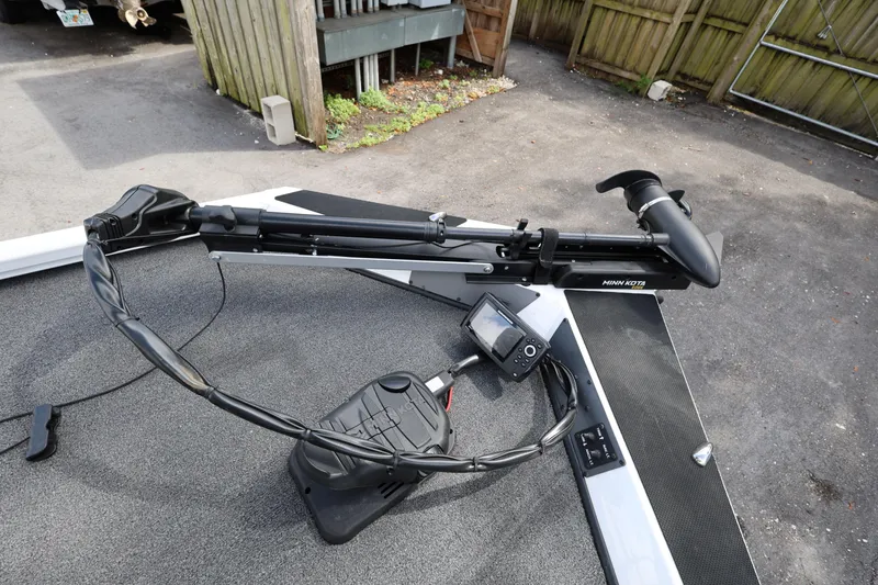 Slide: The Image of 2023 Vexus AVX189 boat with Minn Kota trolling motor and fish finder on deck. - 13