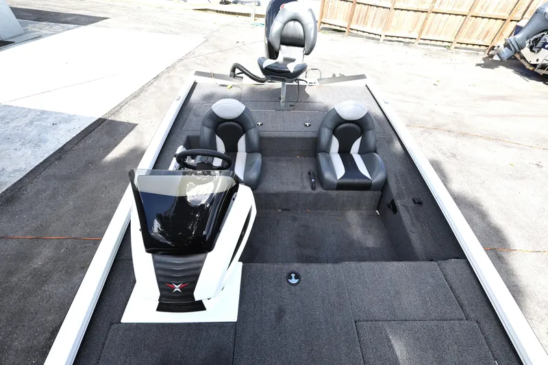 Slide: The Image of 2023 Vexus AVX189 boat interior with sleek seating and modern console design. - 14