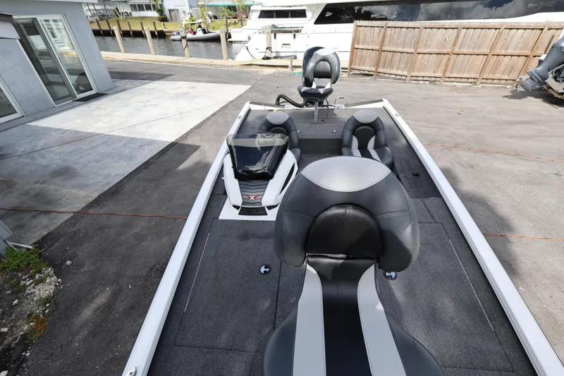 Slide: The Image of 2023 Vexus AVX189 boat interior with sleek seating and modern design. - 16