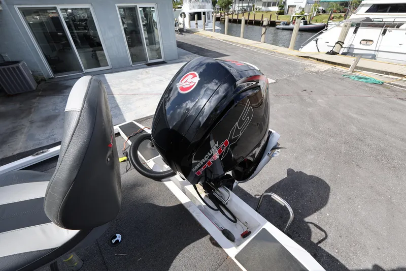 Slide: The Image of 2023 Vexus AVX189 boat with Mercury Pro XS outboard motor at dockside. - 18