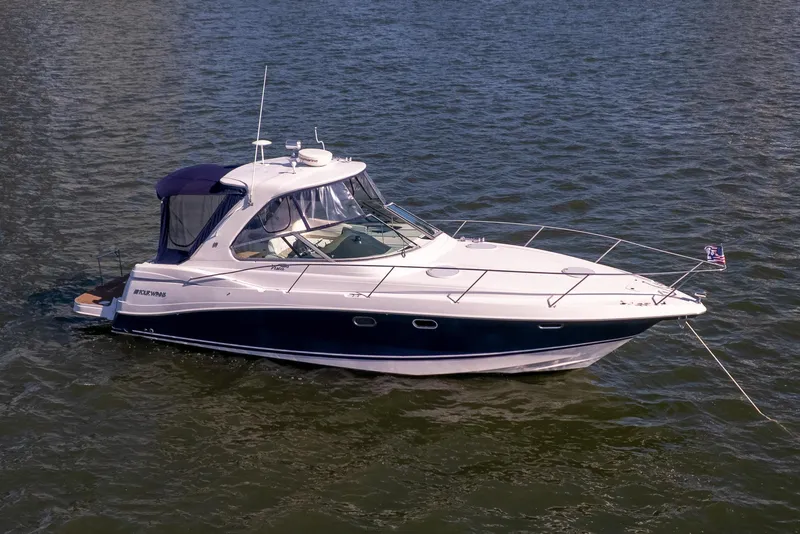 The Image of 2005 Four Winns 378 Vista yacht on calm water, featuring sleek design and modern amenities. - 0