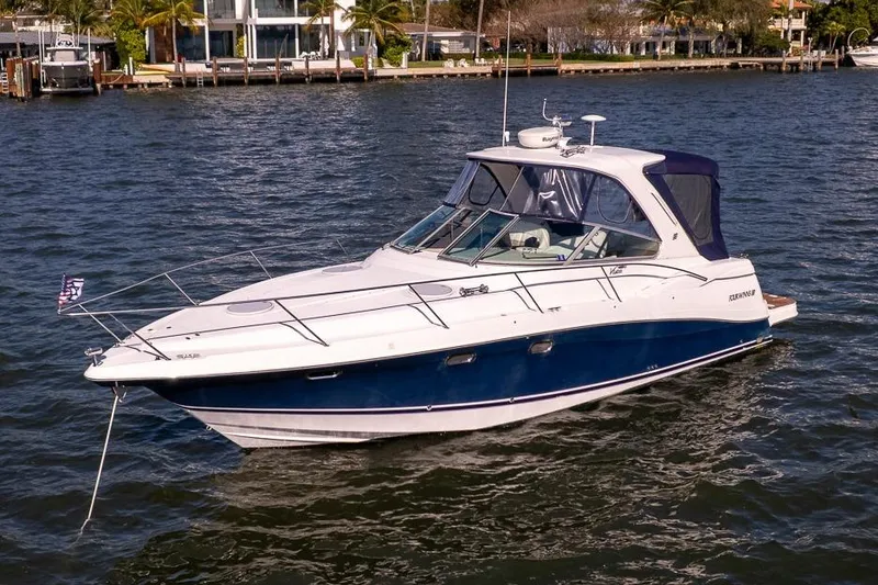 Slide: The Image of 2005 Four Winns 378 Vista yacht on calm water, featuring sleek design and modern amenities. - 3