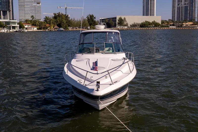 Slide: The Image of 2005 Four Winns 378 Vista yacht on water, city skyline in background. - 4