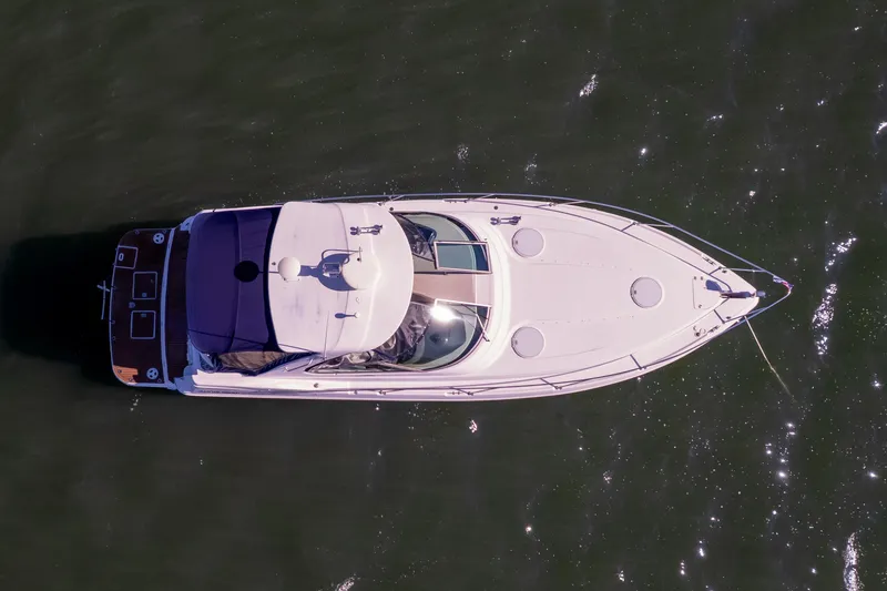 Slide: The Image of Aerial view of 2005 Four Winns 378 Vista boat on water. - 5