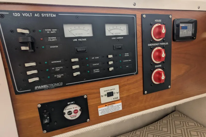 Slide: The Image of Control panel of 2020 Cutwater C-24 Coupe boat with electrical switches and gauges. - 15