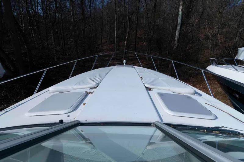 Slide: The Image of 2004 Formula 37 Performance Cruiser boat deck in wooded area. - 10