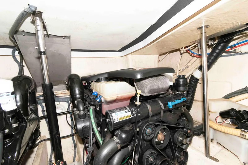 Slide: The Image of Engine room of a 2004 Formula 37 Performance Cruiser, showcasing mechanical components. - 18