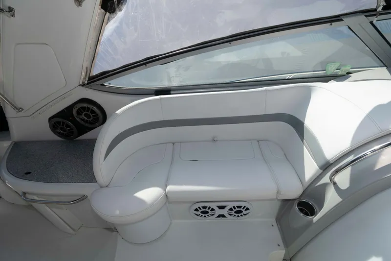 Slide: The Image of 2004 Formula 37 Performance Cruiser interior with white seating and built-in speakers. - 9