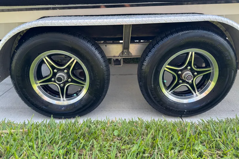 Slide: The Image of 2023 Carolina Skiff 21 SWS boat hull on trailer, close-up view. - 12