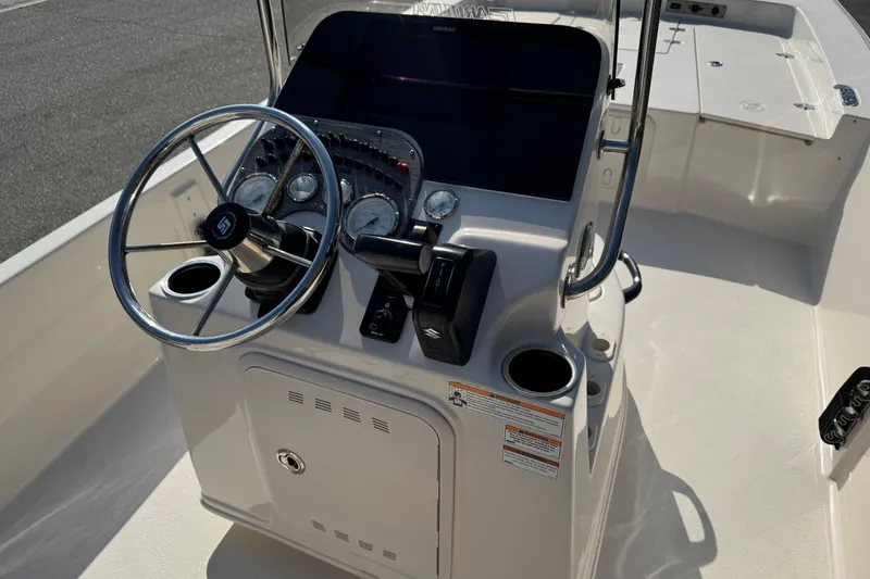 Slide: The Image of Close-up of a 2023 Carolina Skiff 21 SWS boat propeller in sunlight. - 21