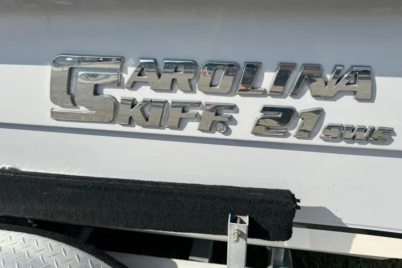 Slide: The Image of 2023 Carolina Skiff 21 SWS boat on trailer with Suzuki outboard motor. - 4