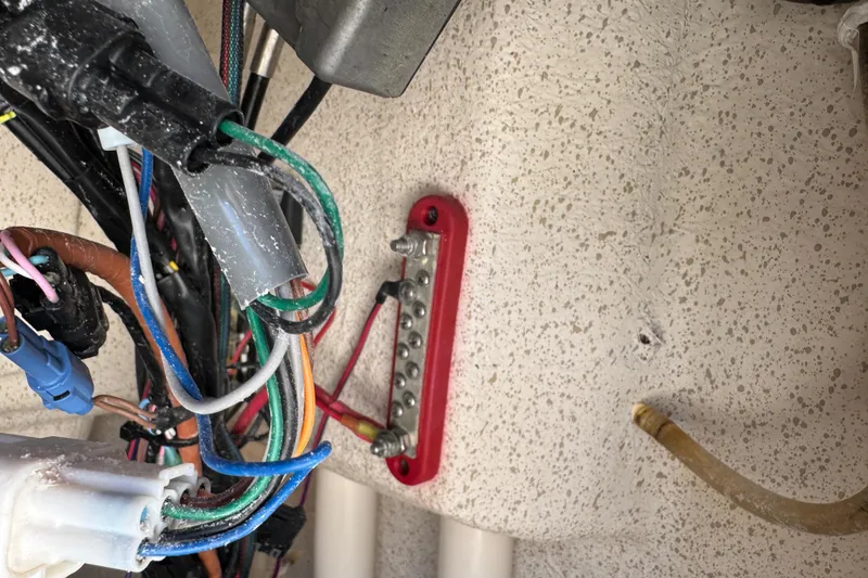 Slide: The Image of 2023 Carolina Skiff 21 SWS boat ladder, stainless steel, mounted on white platform. - 42