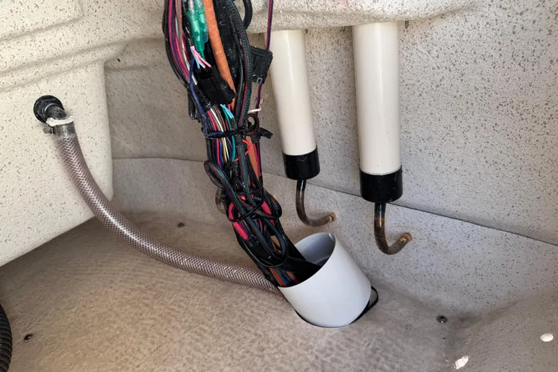 Slide: The Image of Interior wiring and components of a 2023 Carolina Skiff 21 SWS boat. - 45