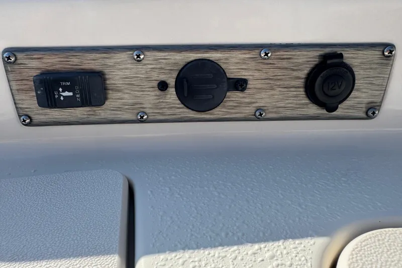 Slide: The Image of 2023 Carolina Skiff 21 SWS boat deck with storage compartments and clean design. - 53