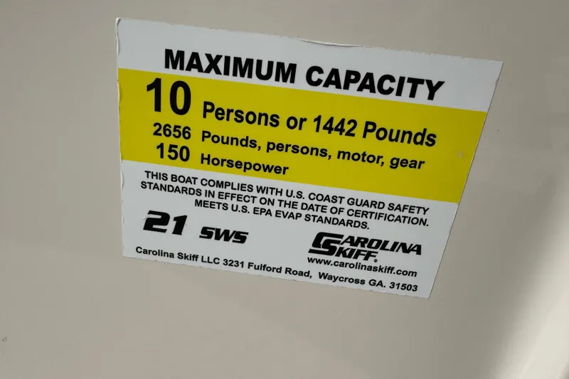 Slide: The Image of 2023 Carolina Skiff 21 SWS boat deck with storage compartments and fixtures. - 54