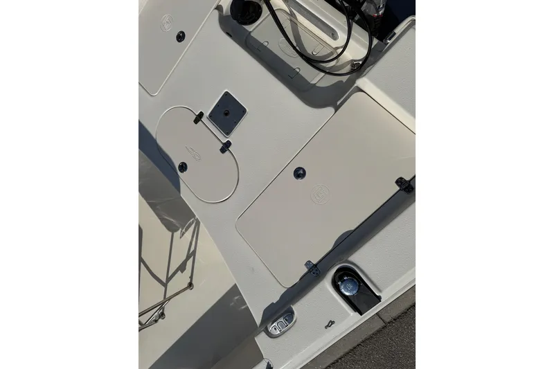 Slide: The Image of 2023 Carolina Skiff 21 SWS boat interior, showcasing deck and seating area. - 58