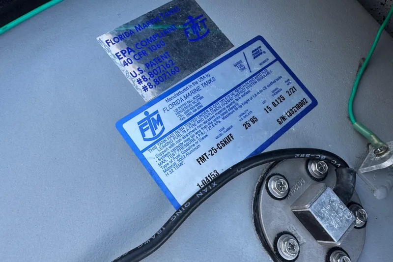 Slide: The Image of 2023 Carolina Skiff 21 SWS boat wiring and plumbing details in the engine compartment. - 67