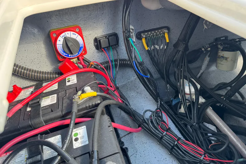 Slide: The Image of 2023 Carolina Skiff 21 SWS fuel tank with wiring and label details. - 72