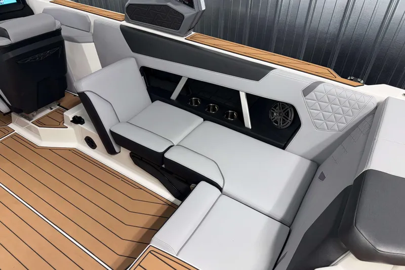 Slide: The Image of 2026 Nautique Super Air Nautique GS22 interior with sleek seating and modern design. - 11
