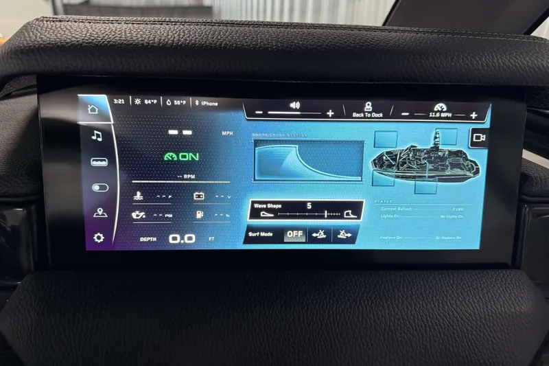 Slide: The Image of 2026 Nautique Super Air Nautique GS22 dashboard display with wave settings and navigation controls. - 19