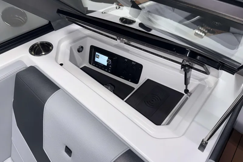 Slide: The Image of 2026 Nautique Super Air Nautique GS22 dashboard with modern controls and sleek design. - 25