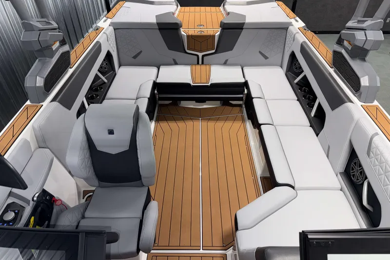 Slide: The Image of Luxurious interior of 2026 Nautique Super Air Nautique GS22 boat with spacious seating. - 27