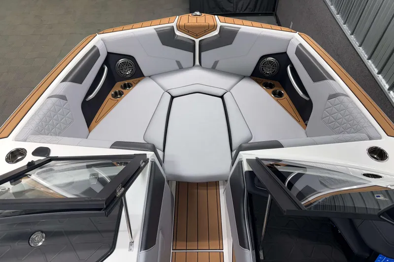 Slide: The Image of 2026 Nautique Super Air Nautique GS22 boat interior with luxurious seating and modern design. - 28