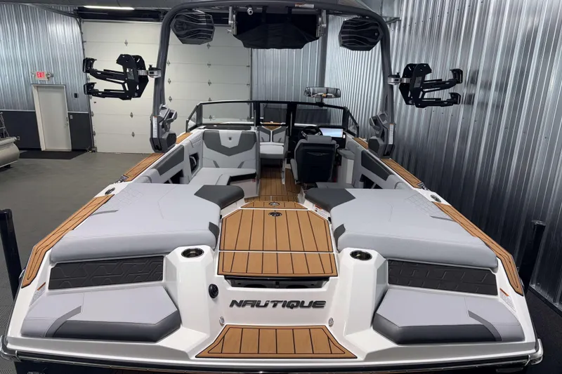 Slide: The Image of 2026 Nautique Super Air Nautique GS22 boat interior with sleek design and modern features. - 3