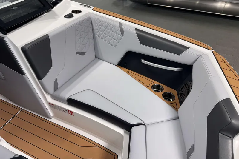 Slide: The Image of 2026 Nautique Super Air Nautique GS22 interior with sleek seating and modern design. - 30