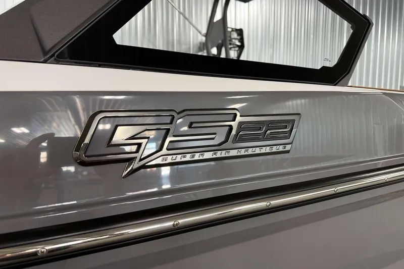 Slide: The Image of 2026 Nautique Super Air Nautique GS22 logo on boat exterior. - 36