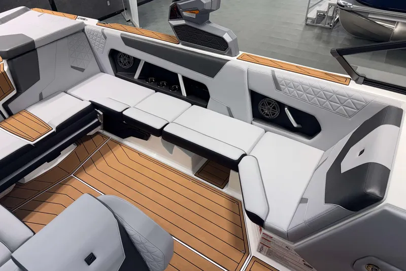 Slide: The Image of 2026 Nautique Super Air Nautique GS22 interior with luxurious seating and modern design. - 9