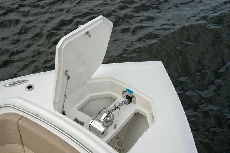 Slide: The Image of Sailfish 360 CC 2022 anchor compartment on calm water. - 11