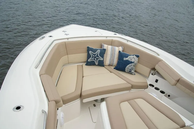 Slide: The Image of Luxurious seating area on a 2022 Sailfish 360 CC boat. - 12
