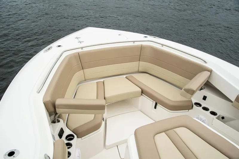 Slide: The Image of Sailfish 360 CC 2022 with luxurious seating arrangement on the water. - 14